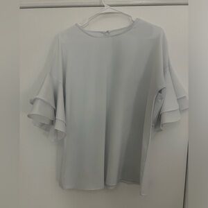 Women’s size large white bell sleeve blouse